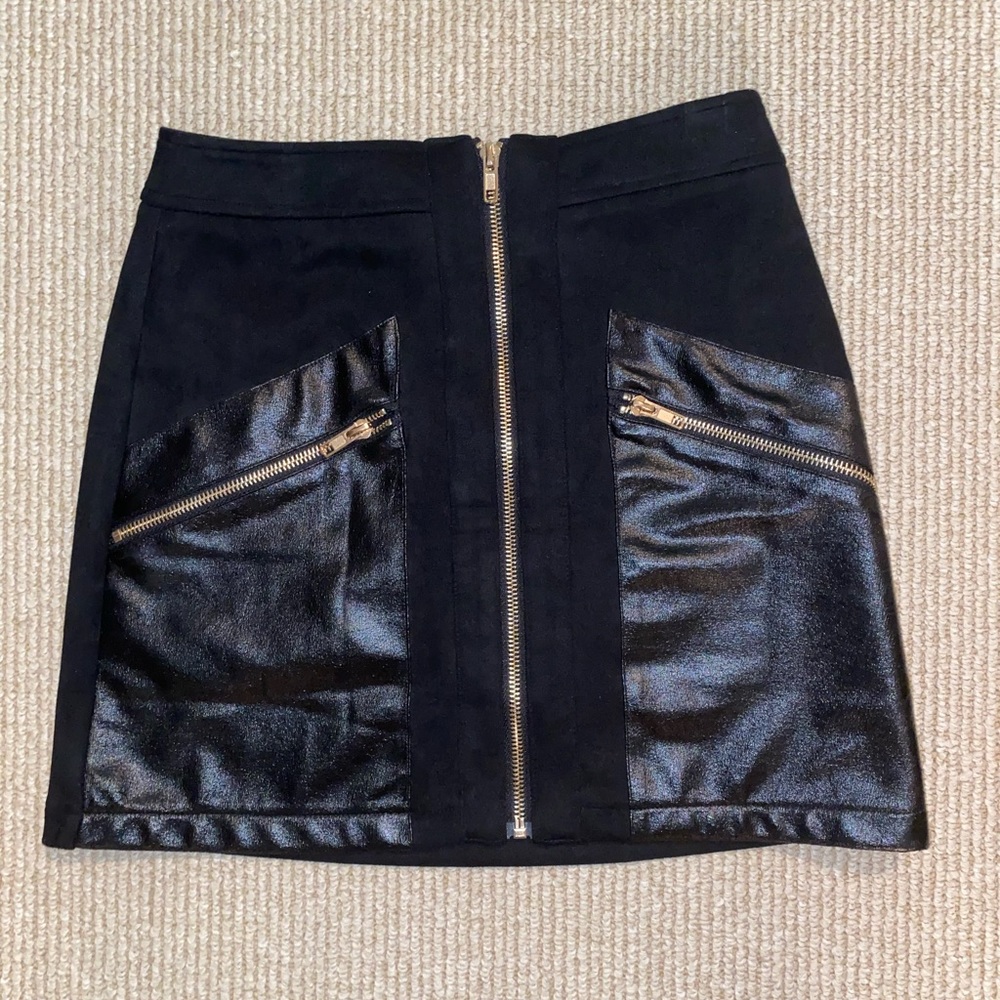 Swade and leather mini skirt
